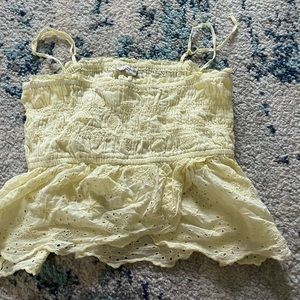 9 name brand tanks, and t shirts. American eagle, hollister, champion, nike, ect